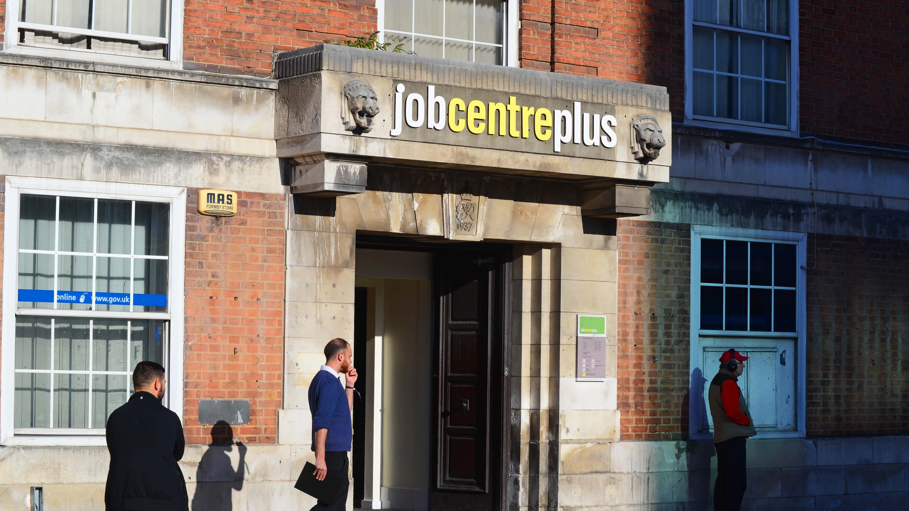 UK unemployment edges down as vacancies fall to near five-year lows