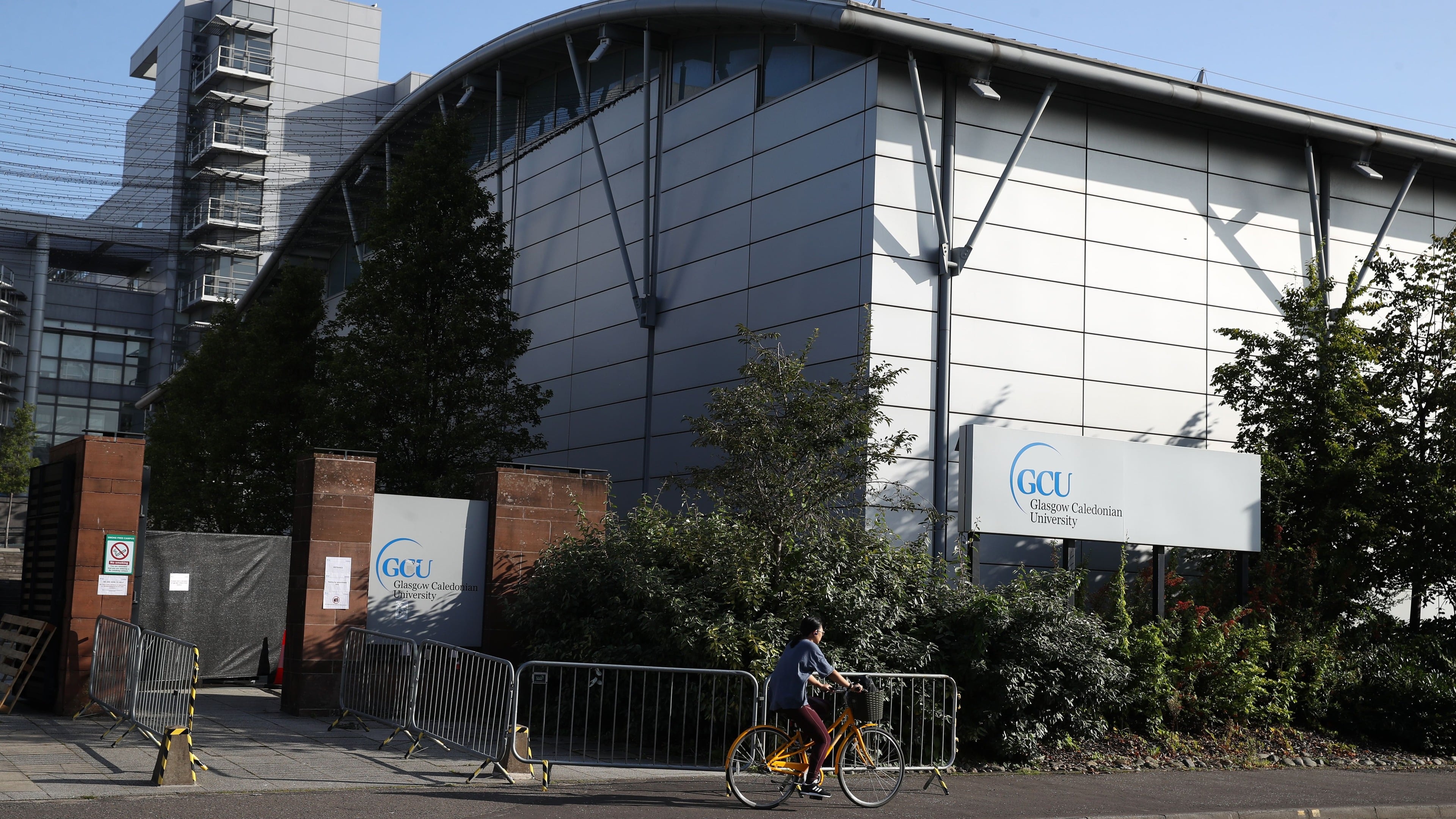 Glasgow Caledonian University staff strike on graduation days amid jobs dispute