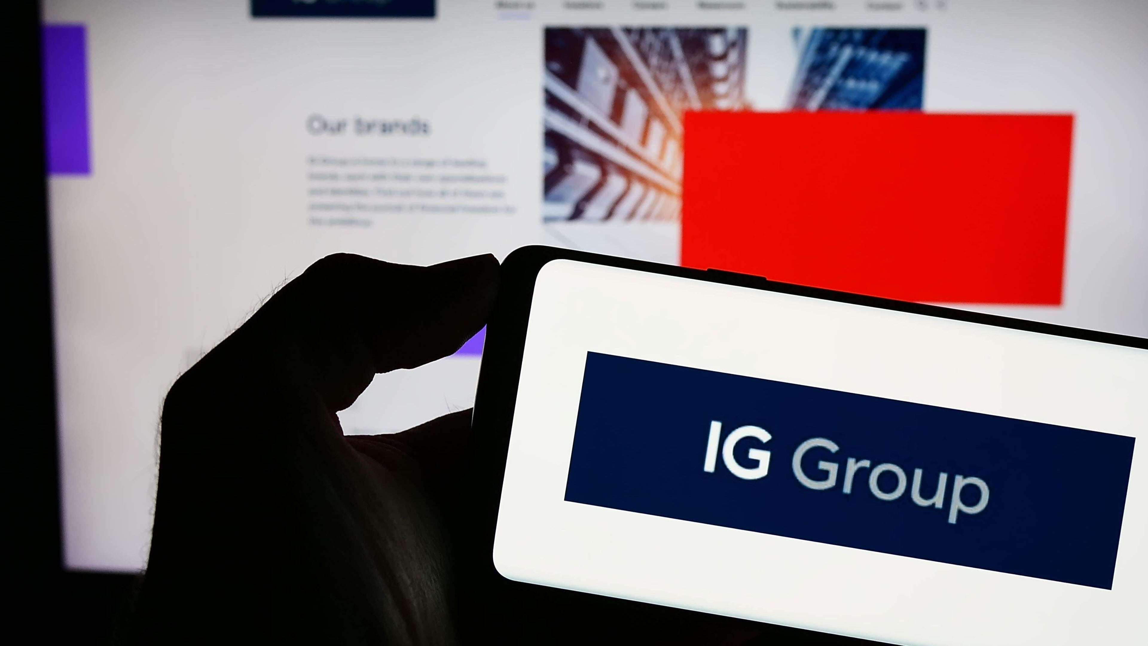 IG Group shares fall after company cuts revenue targets