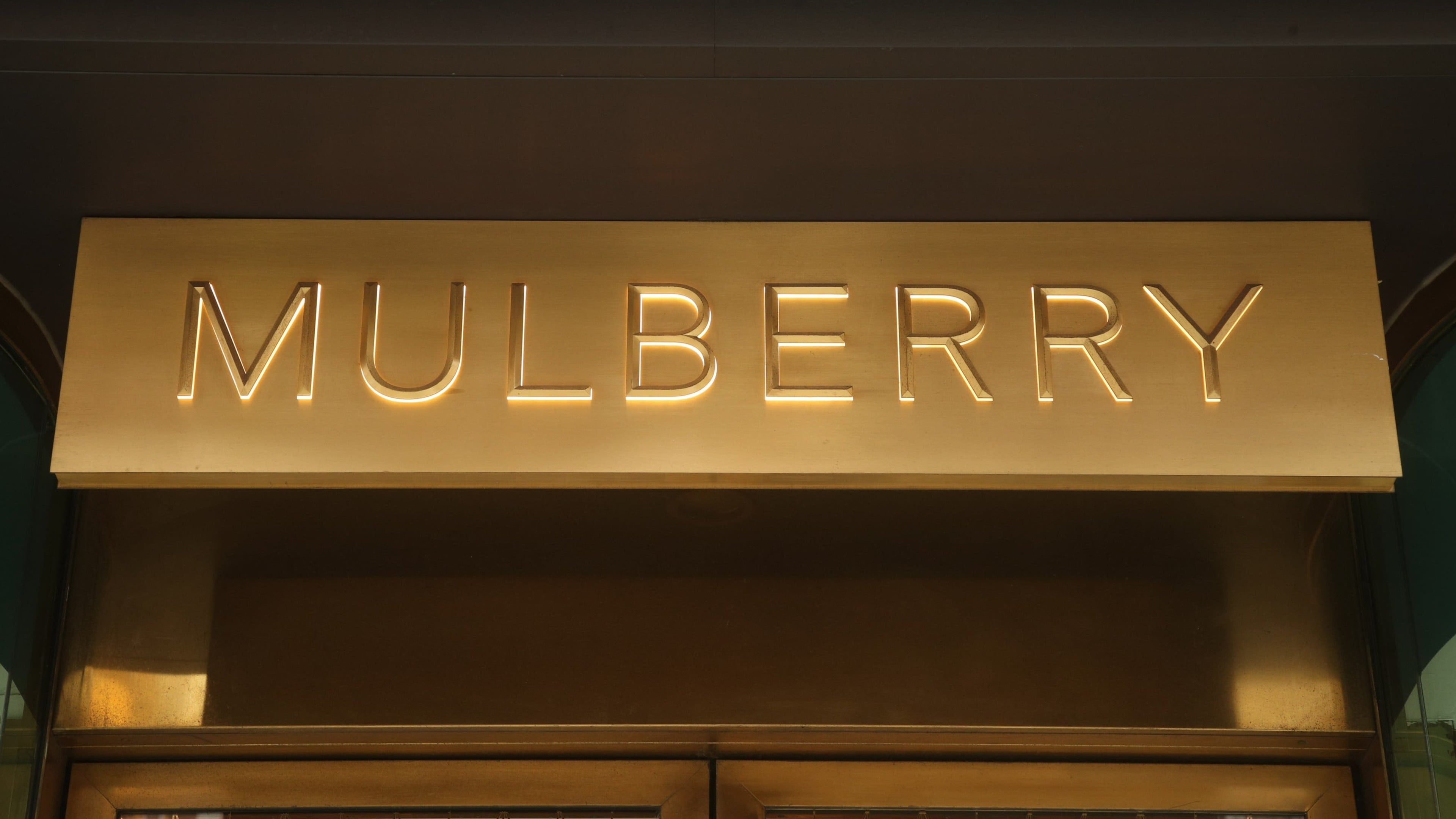 Mulberry reports reduced losses amid progress on turnaround plan