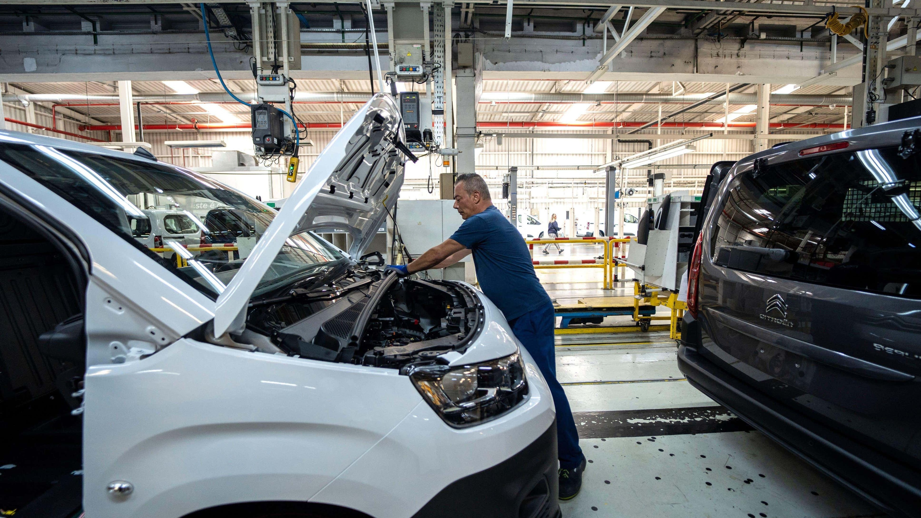 UK factory production rebounds but firms report more delays and inflation