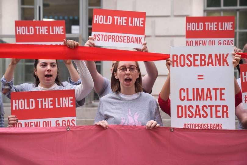 Organisers from Fossil Free London demonstrate as a decision on Jackdaw and Rosebank oil fields is awaited (Maja Smiejkowska/PA)