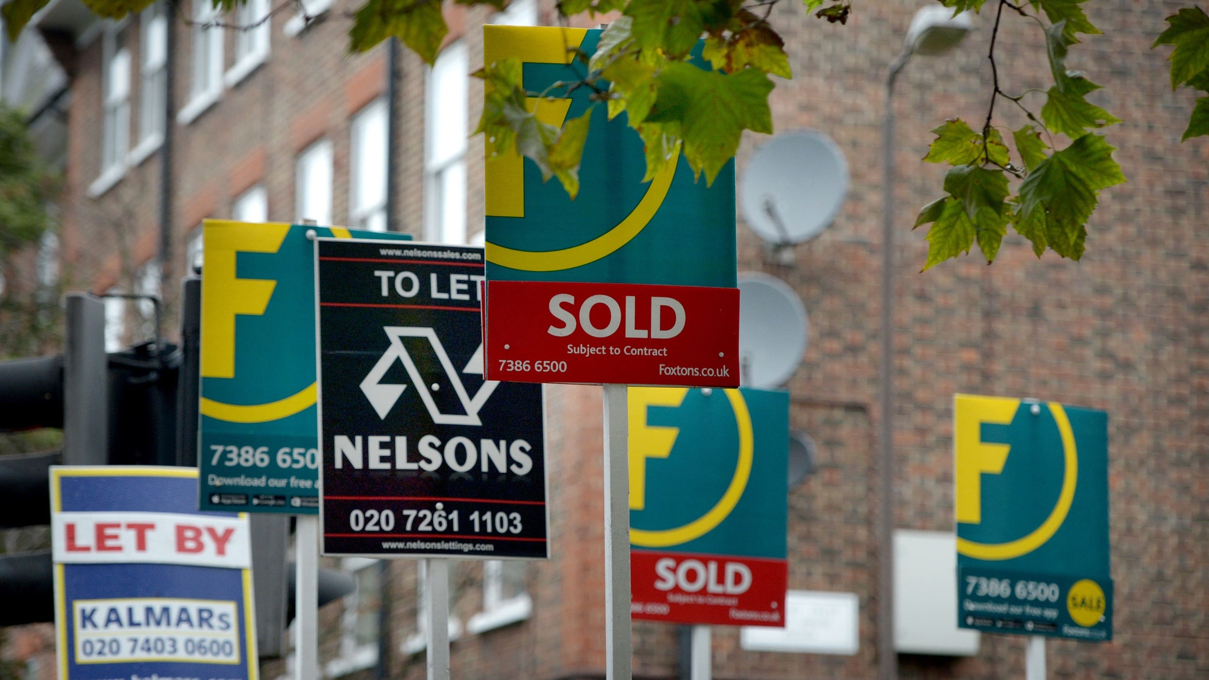 Home sales fall as mortgage rate hikes make buyers more cautious