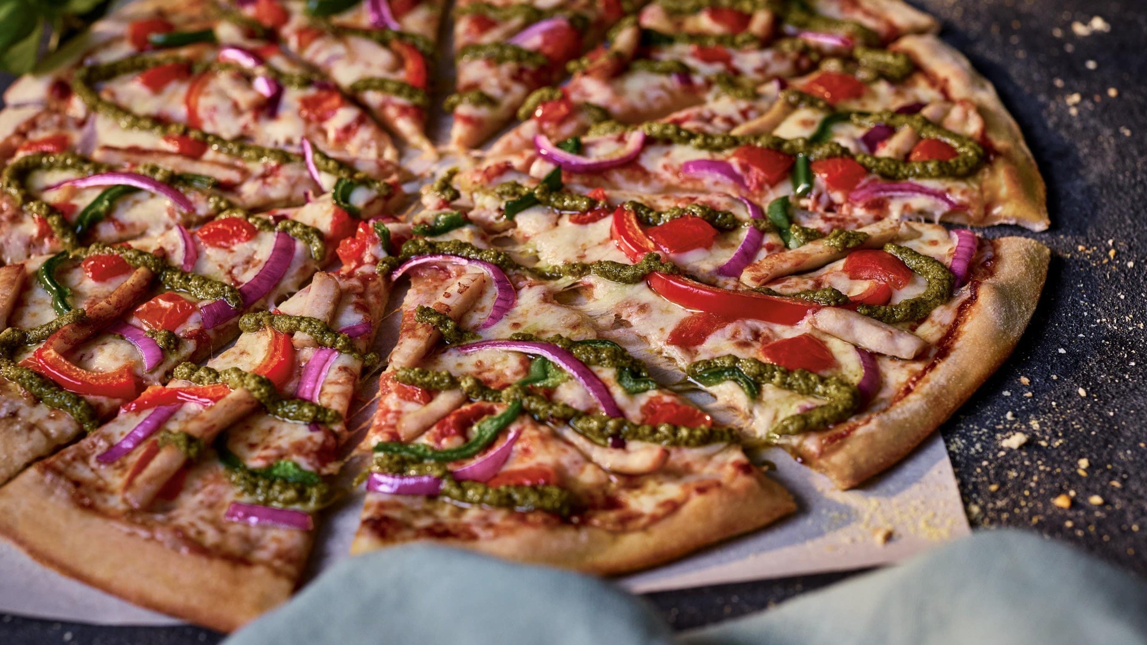 Domino’s takes on restaurant rivals with new range of thinner pizzas