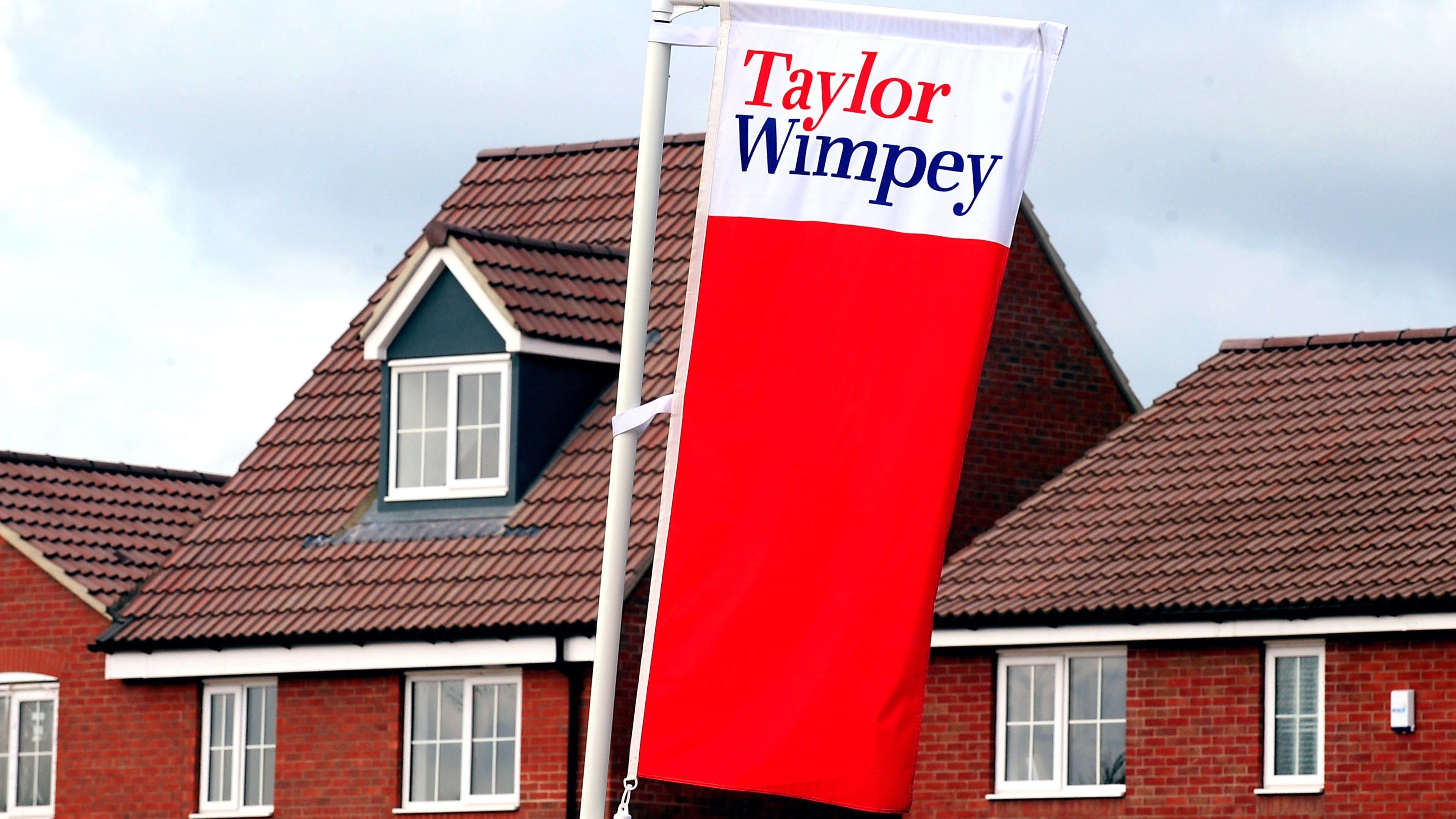 Taylor Wimpey cuts home completion guidance citing challenging market conditions