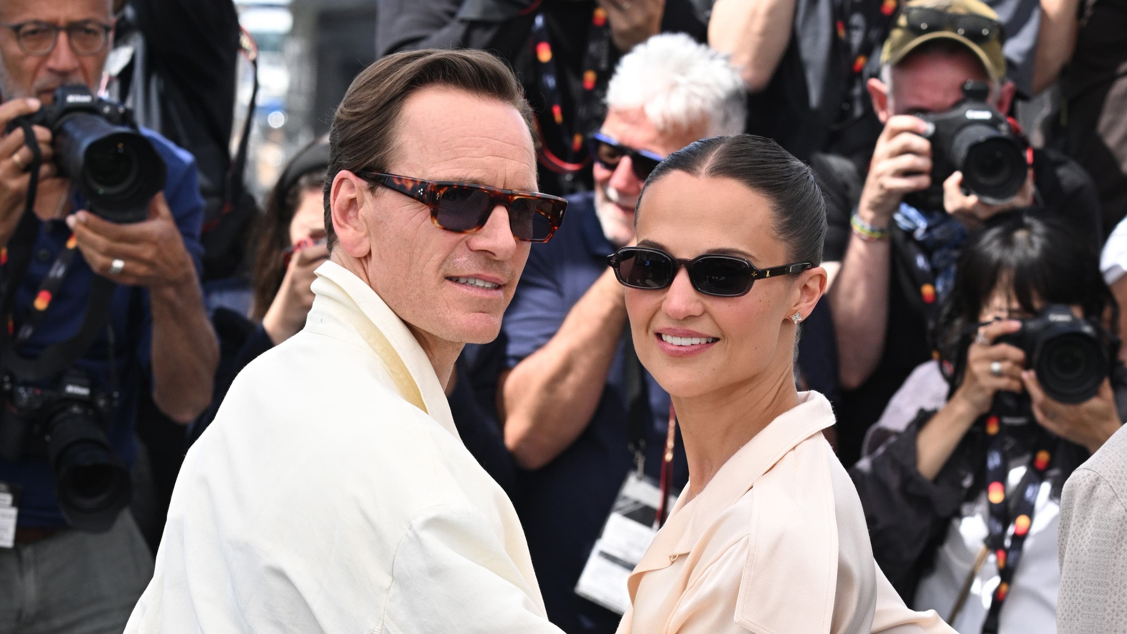 Michael Fassbender smiles alongside wife Alicia Vikander at Cannes