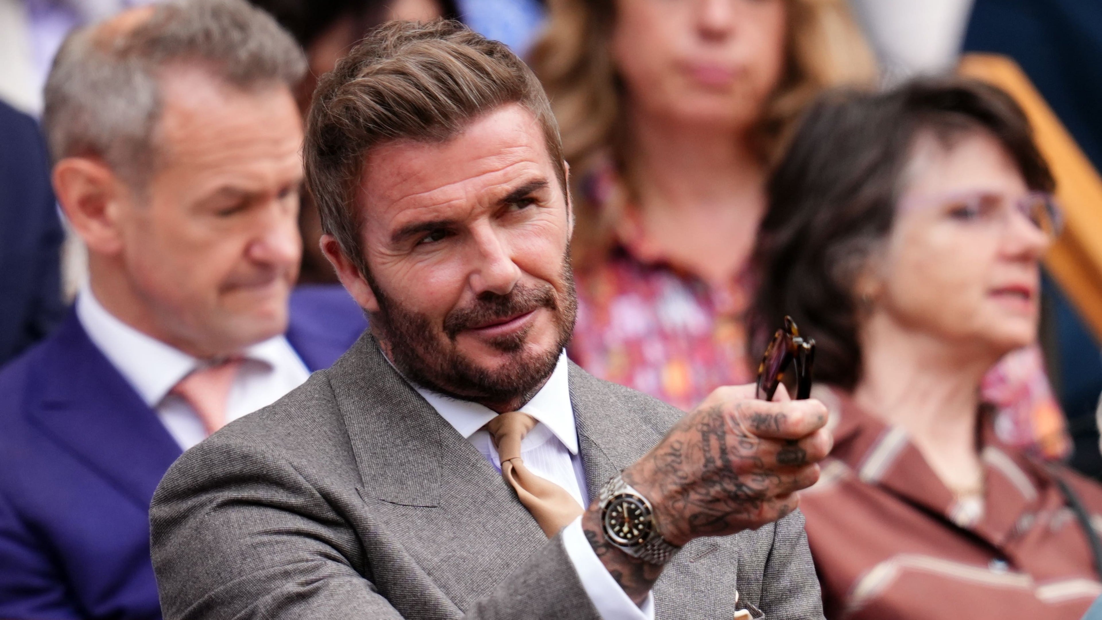 Beckham, Mary Berry and Tess Daly attend Wimbledon as first day begins