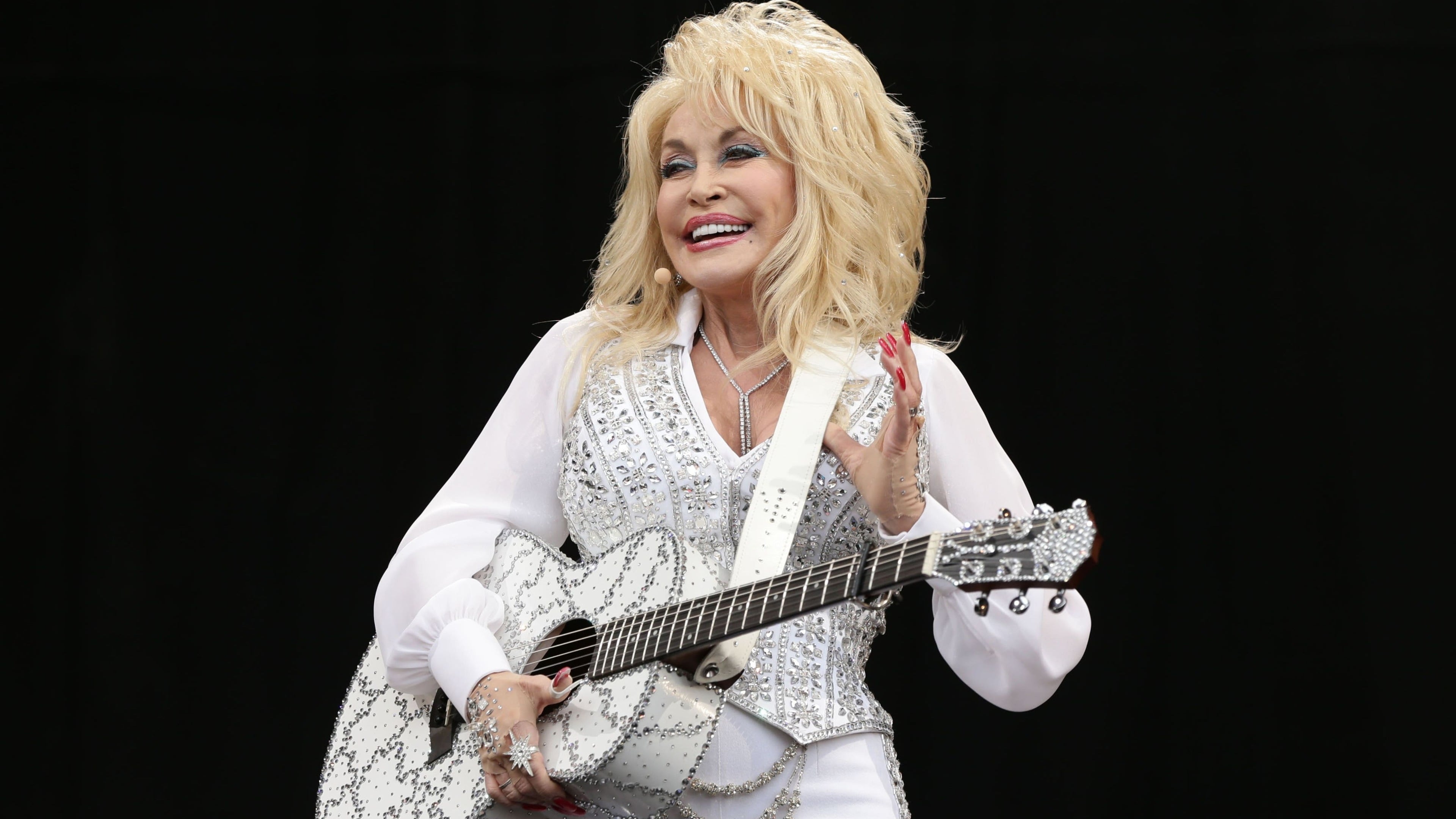 Dolly Parton says she is still healing after health-related cancellations