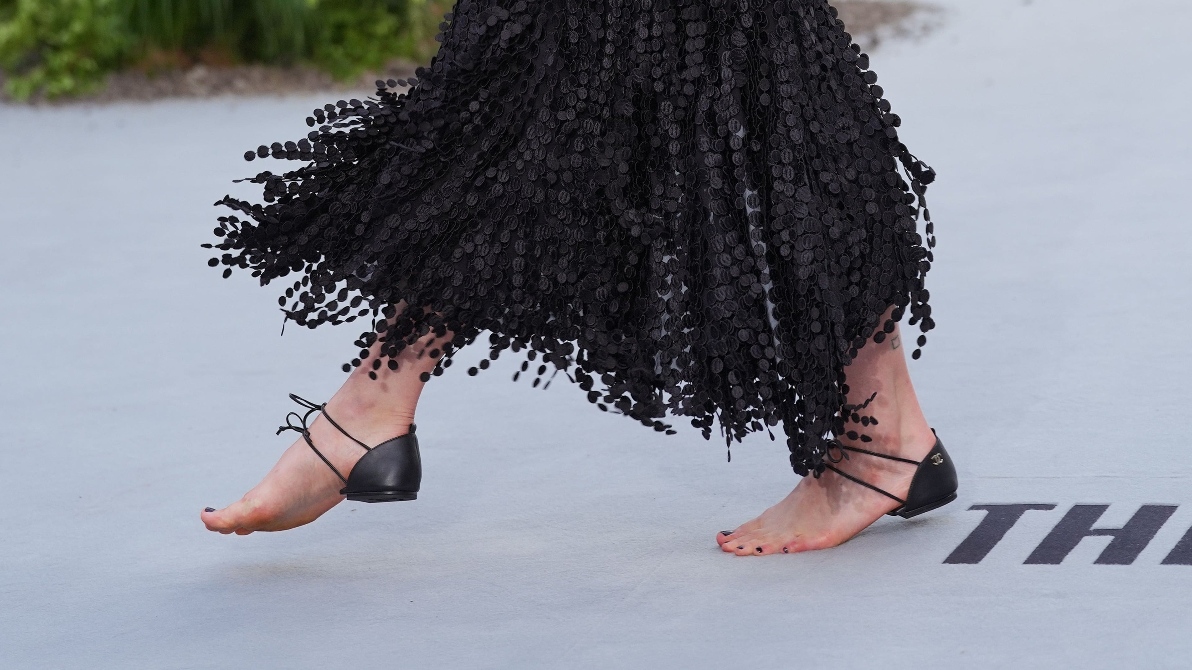 Margaret Qualley walks movie premiere carpet in barefoot Chanel sandals