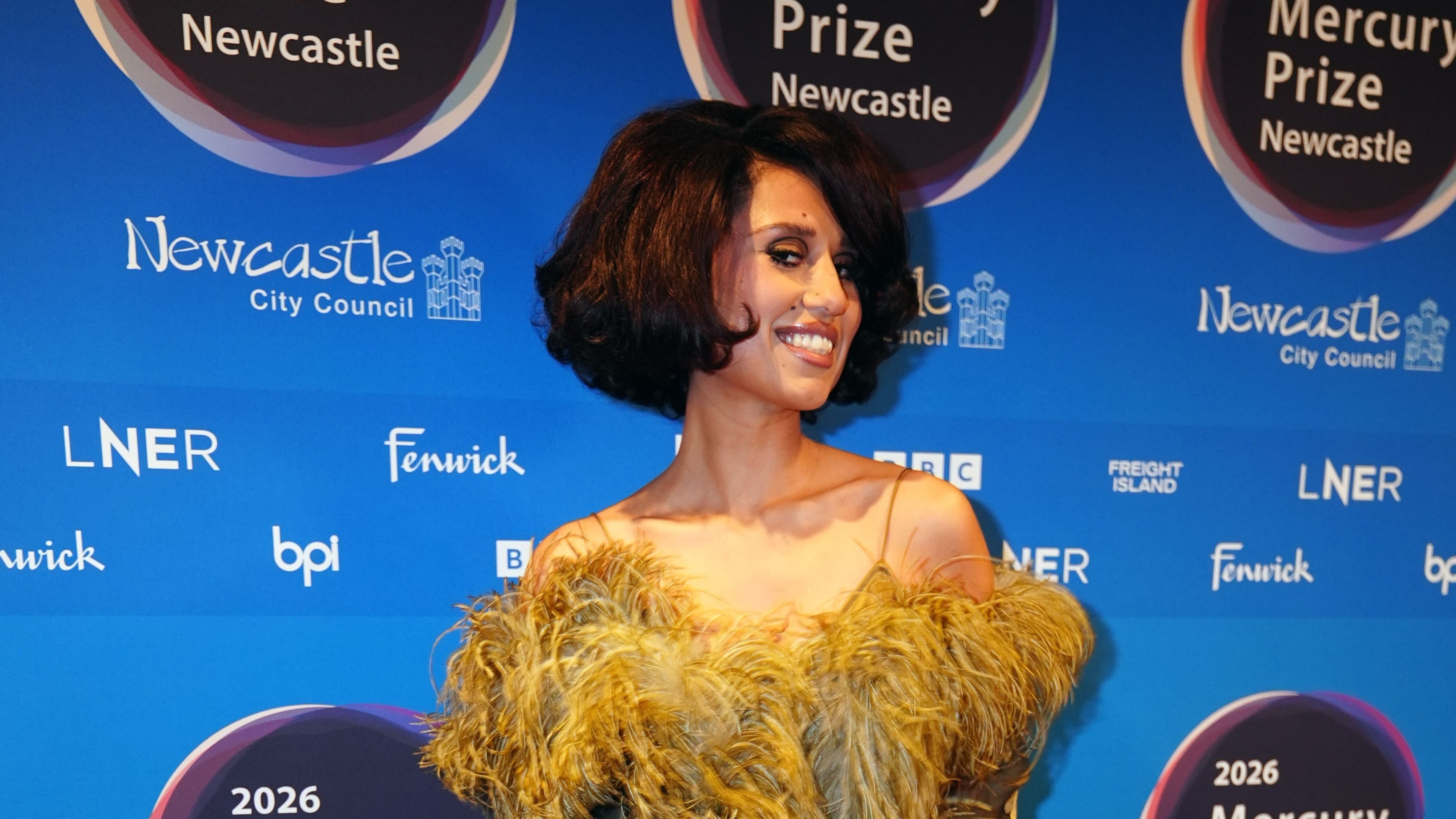 Raye wins Mercury Prize for her album This Music May Contain Hope