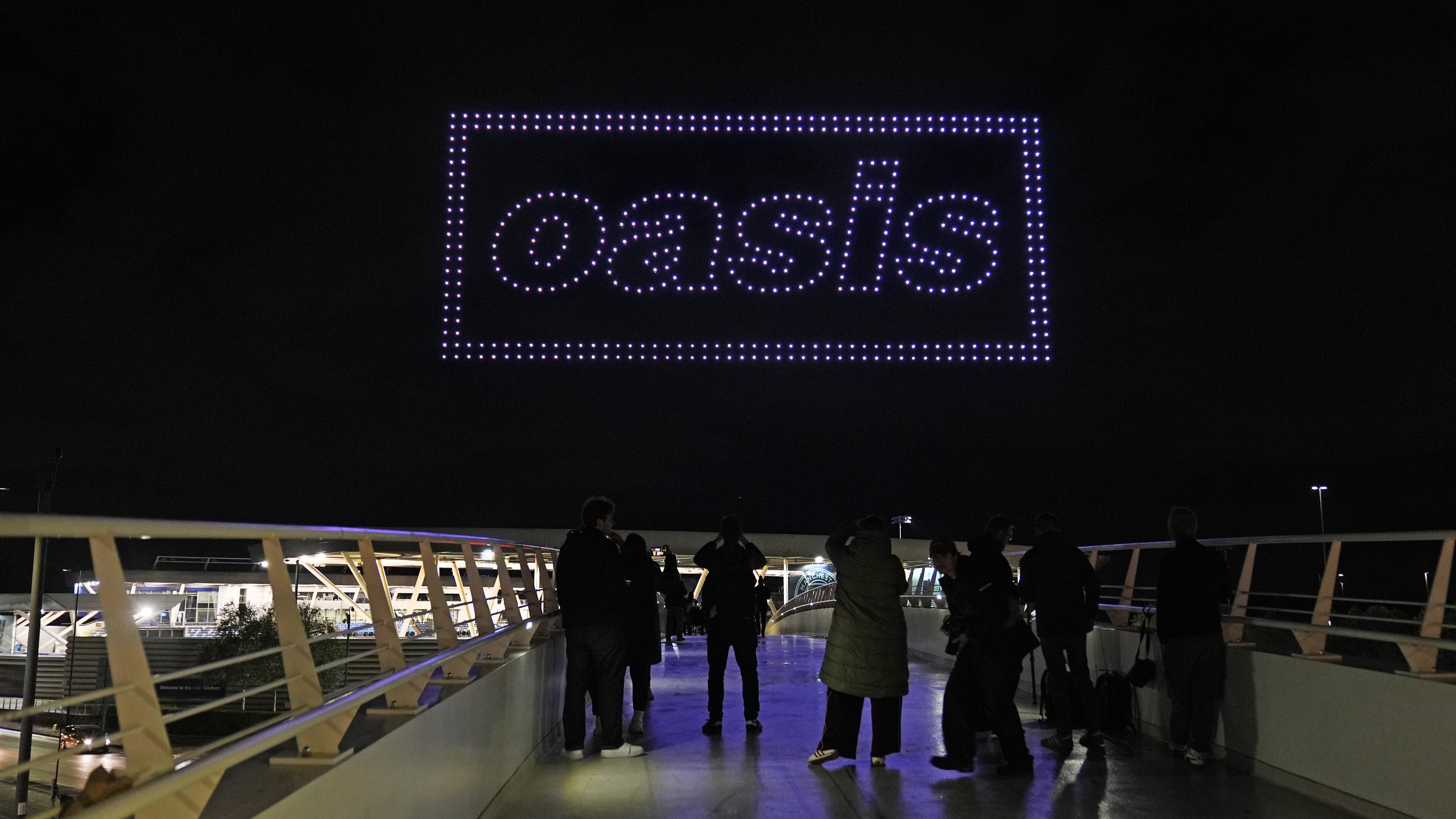 Oasis confirm tour announcement date in drone light show over Manchester