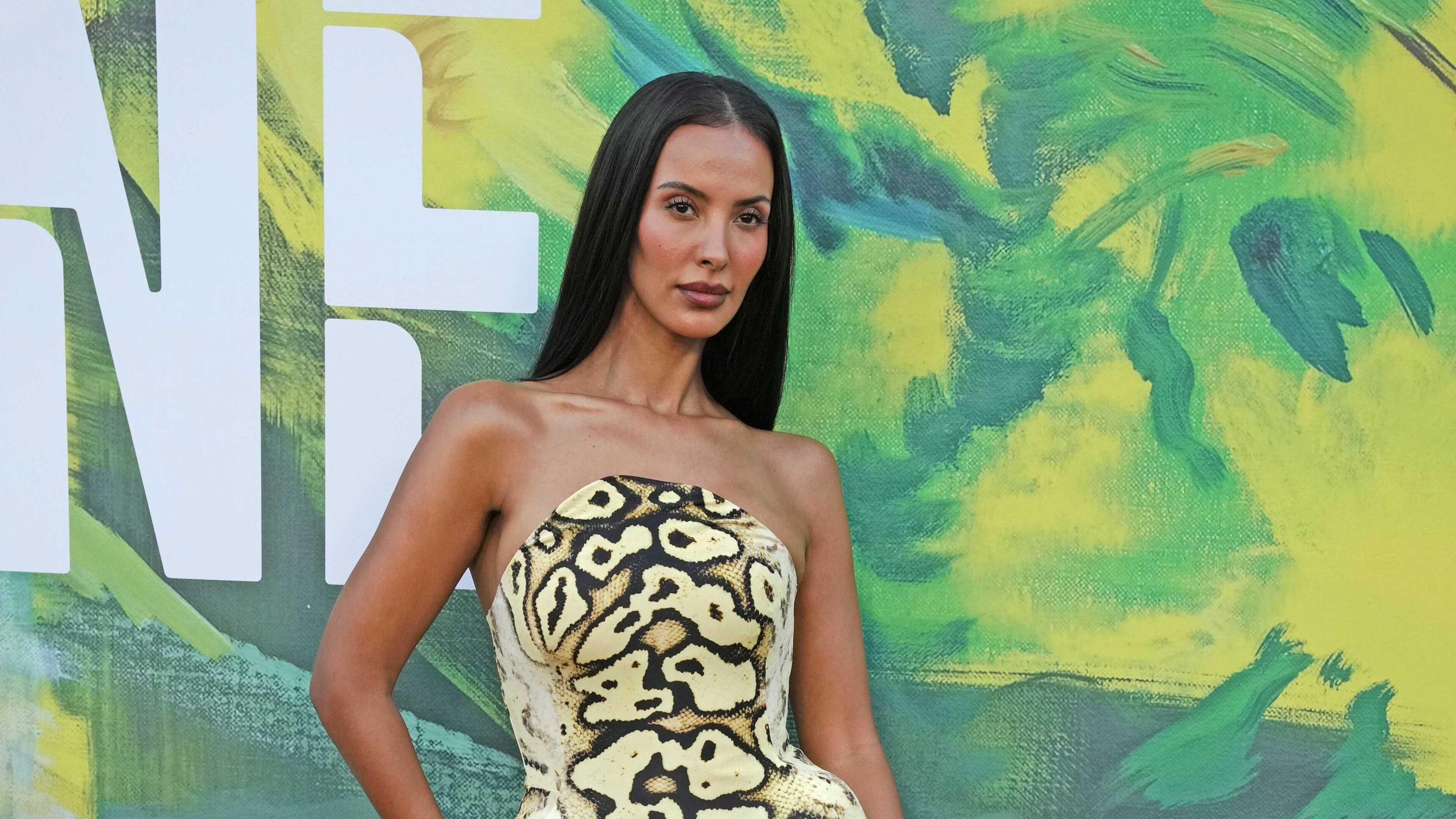 Maya Jama and Novak Djokovic appear on stage at Bad Bunny’s London stadium show