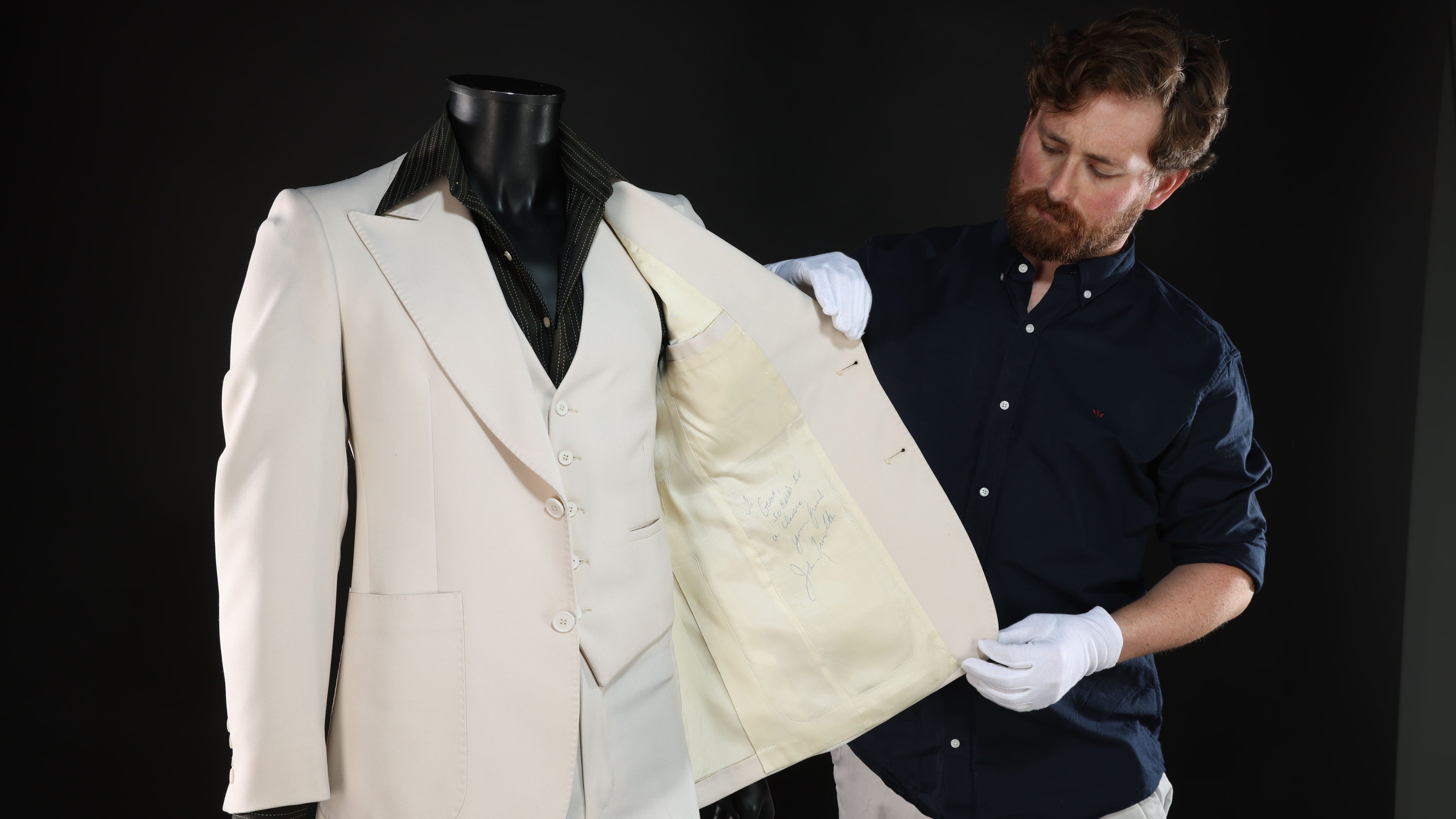 John Travolta’s ‘Saturday Night Fever’ suit expected to fetch about £300,000 at auction