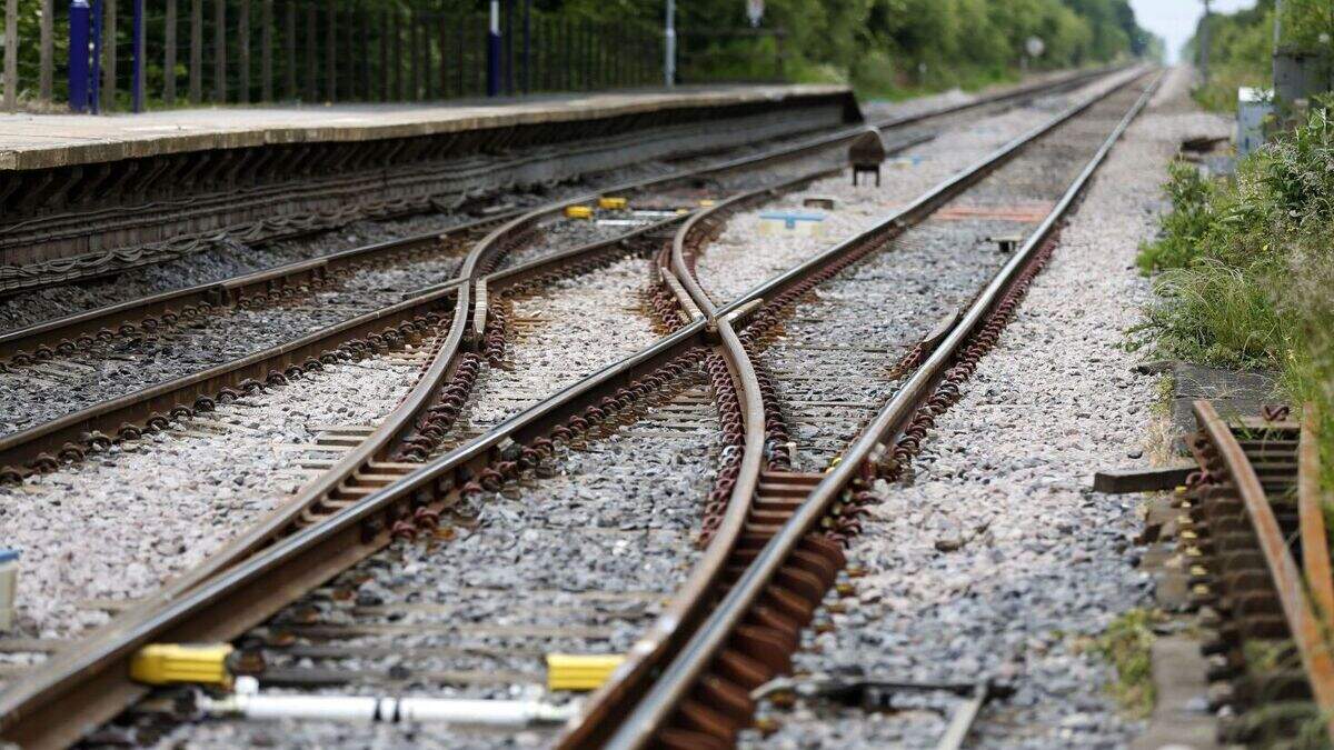 'Near miss' footage shows train almost hitting trespasser | Belfast ...