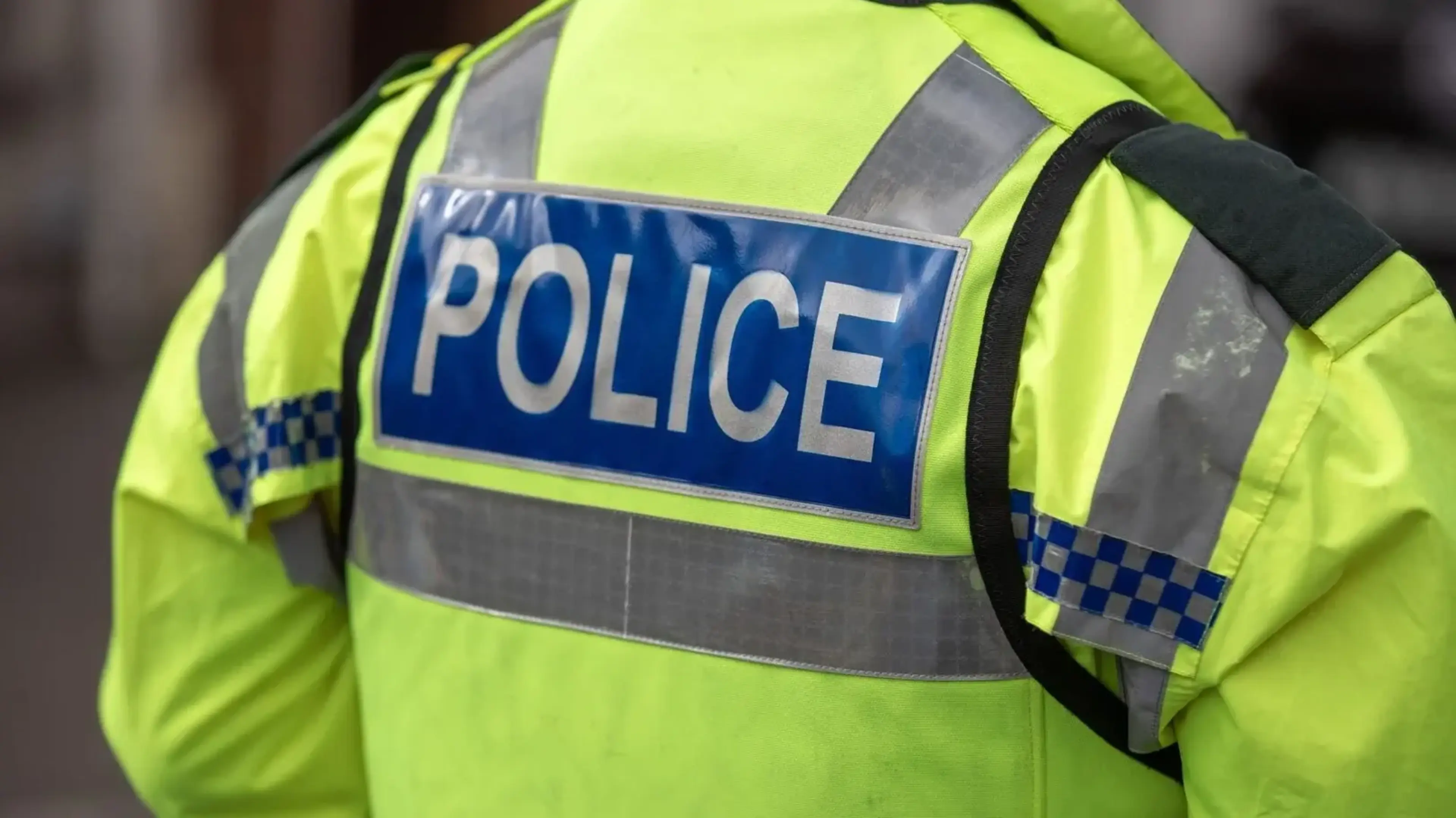 Driver arrested after car flips and crashes into hedge