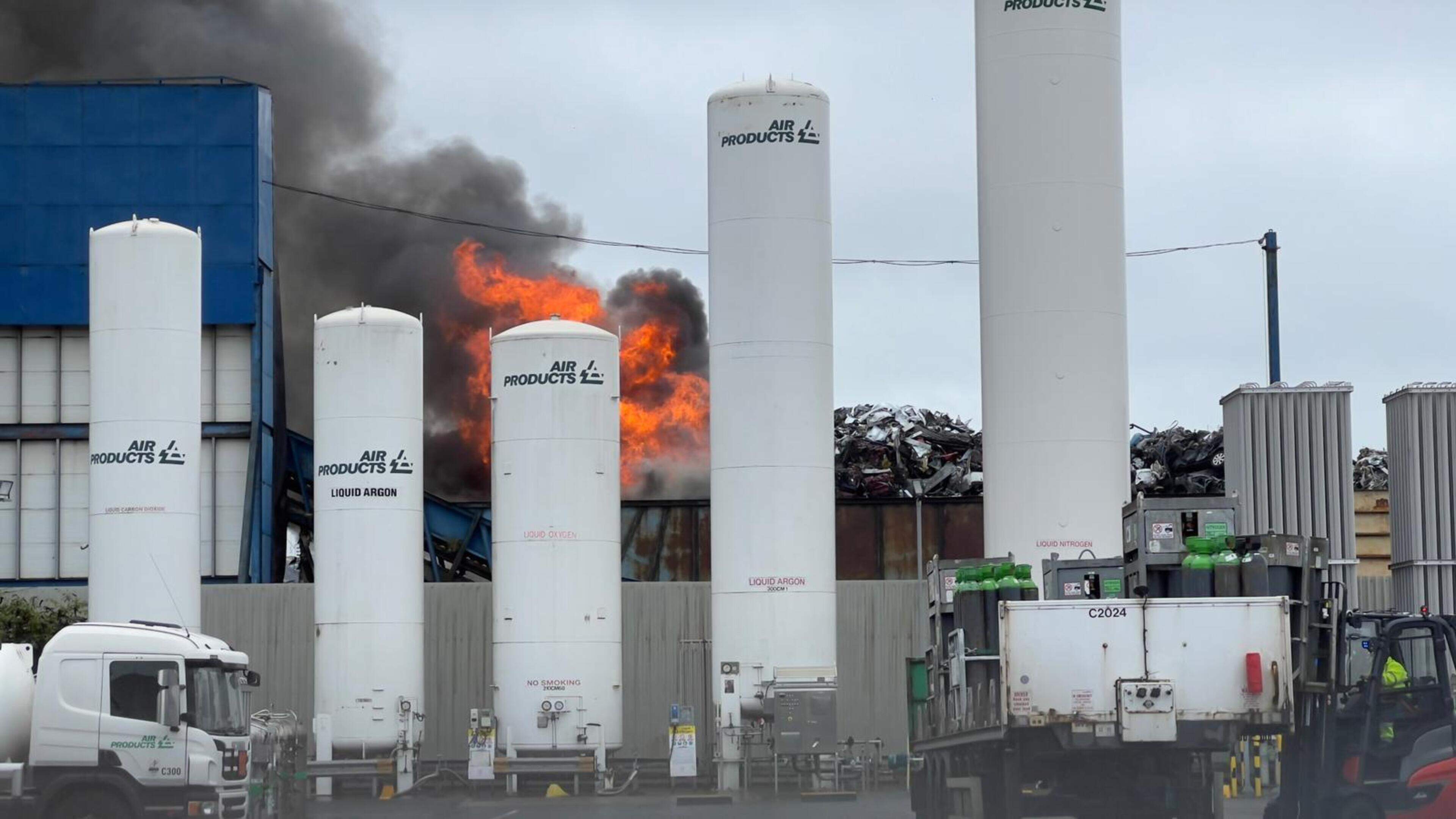 Emergency services tackling major fire at Belfast docks ‘involving a quantity of cars’