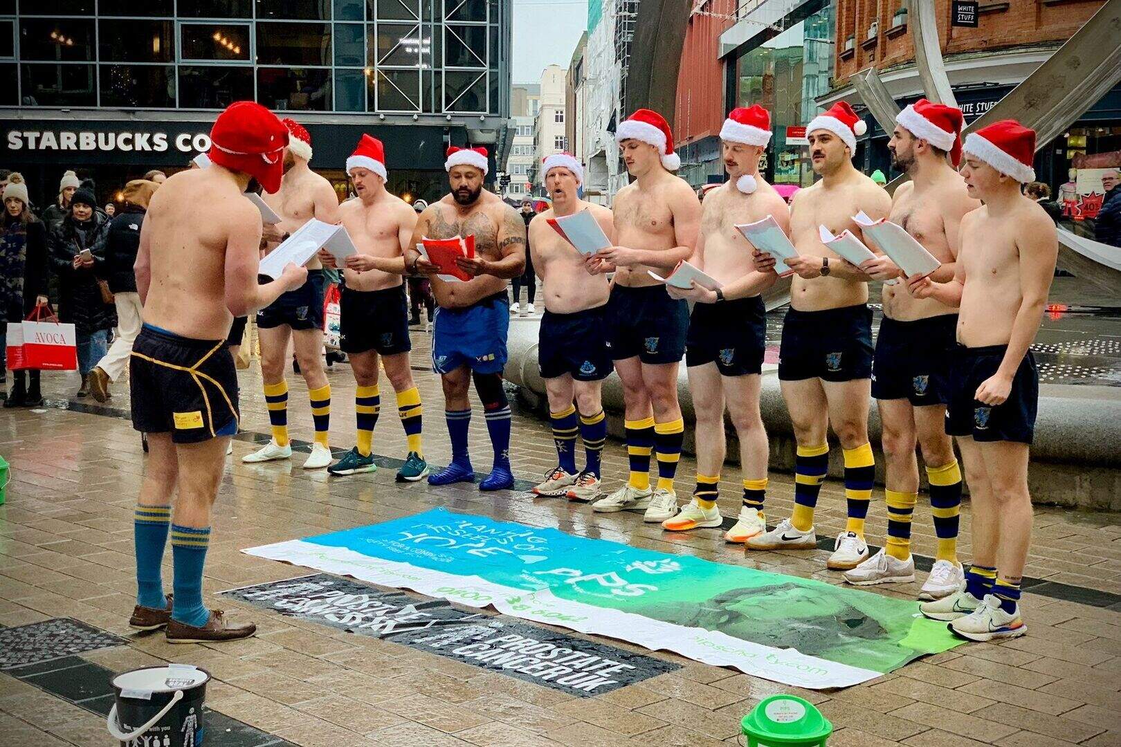 Bangor Rugby Club members braving the cold to raise money for two ...