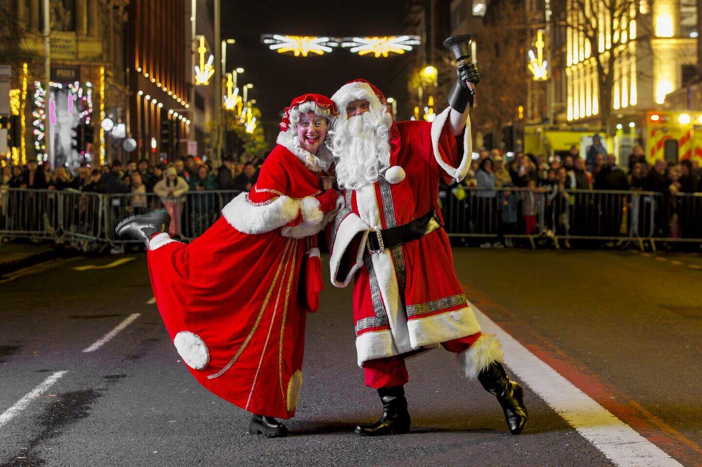Belfast lights up for Christmas as crowds pack into City Hall for ...