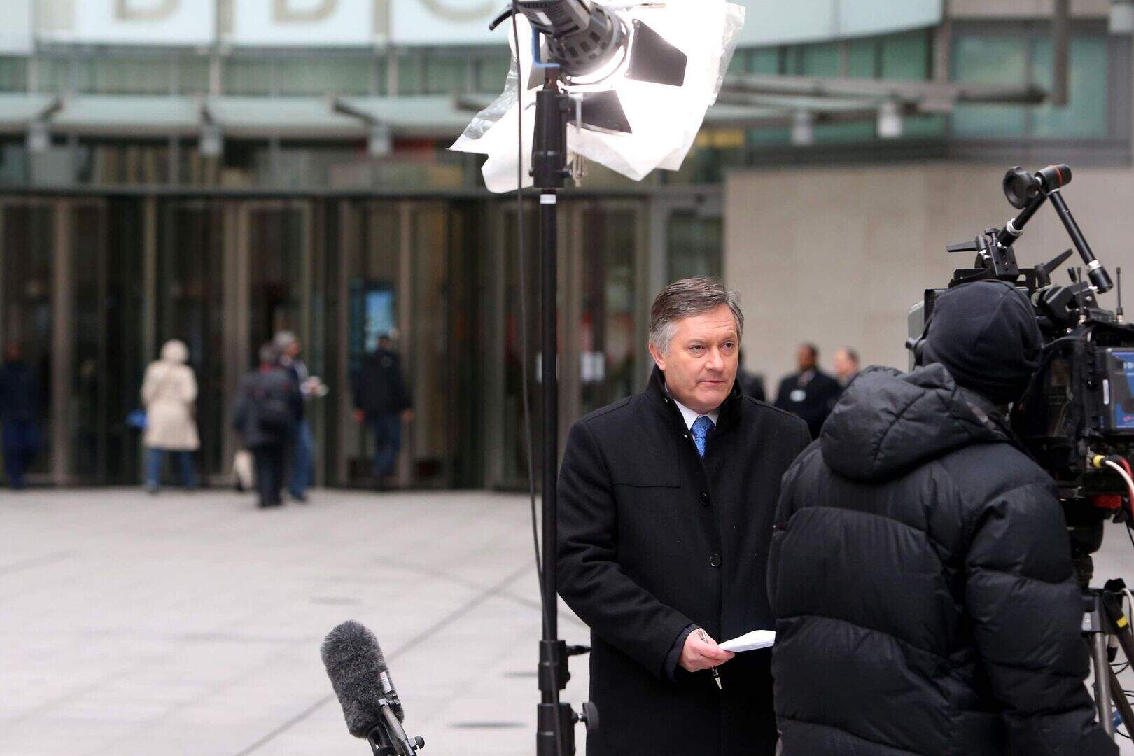 Simon McCoy signs off from BBC News clutching a ream of printer paper ...