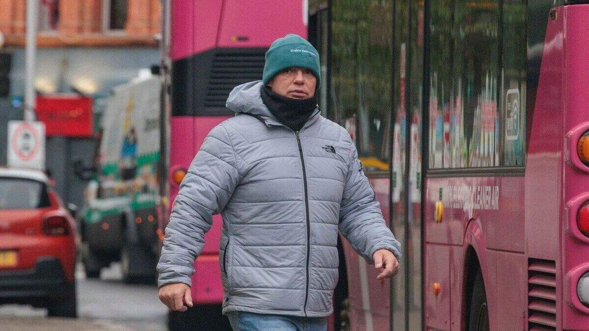 Cut-throat killer returned to jail after cruising around Belfast in car with a woman