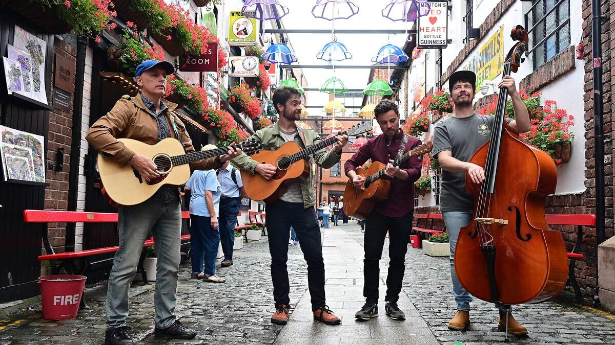 Music, memories and a wake in a caravan: Fleadh brings Belfast’s streets to life