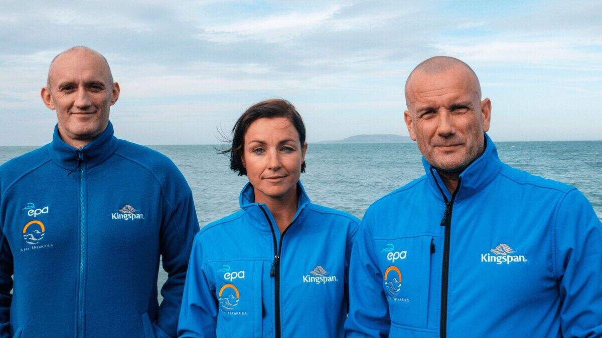 Irish swimmers on the crest of a wave after breaking North Channel ...