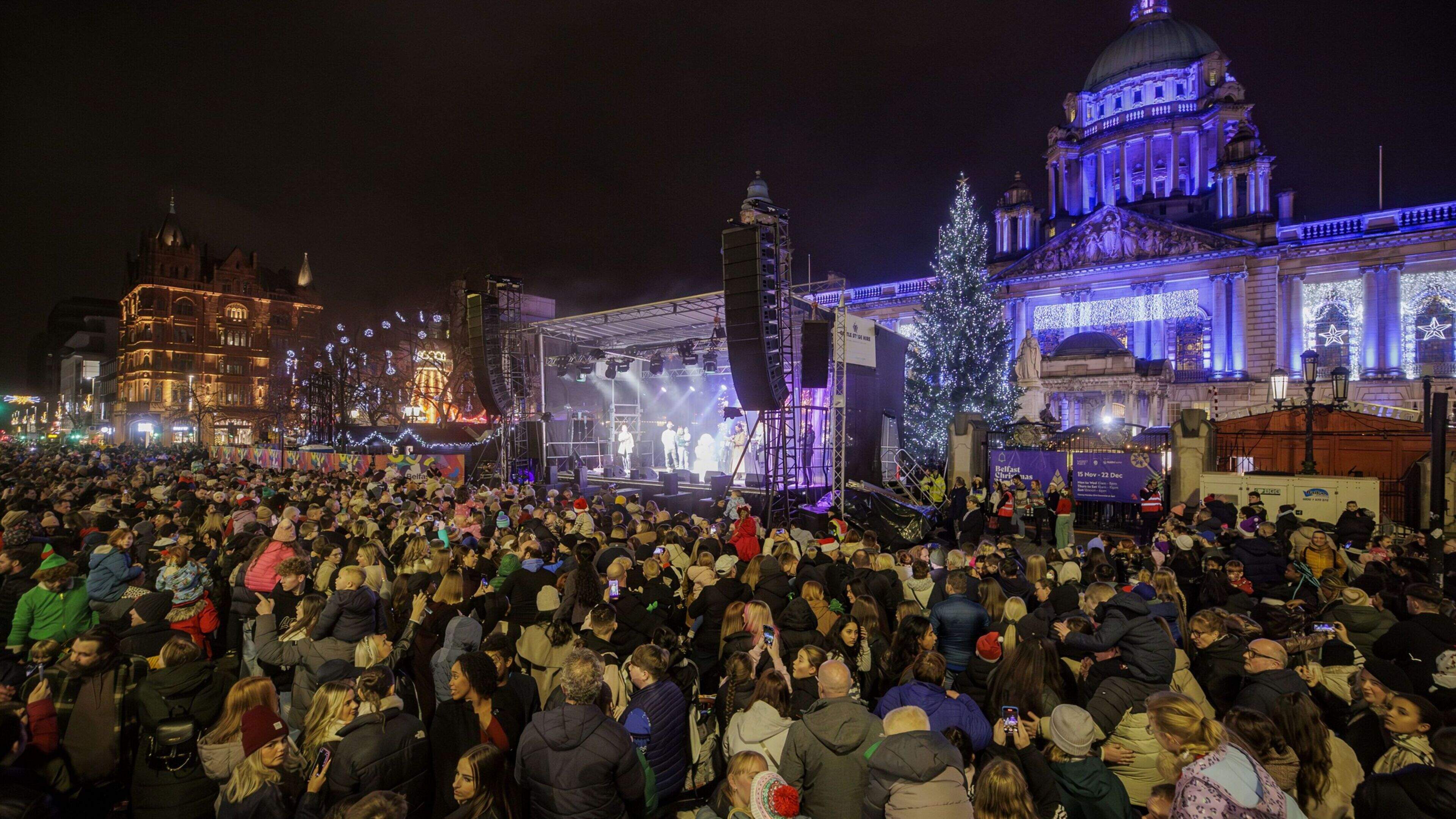 Crowds watching the Christmas lights switch-on at Belfast City Hall in an earlier year