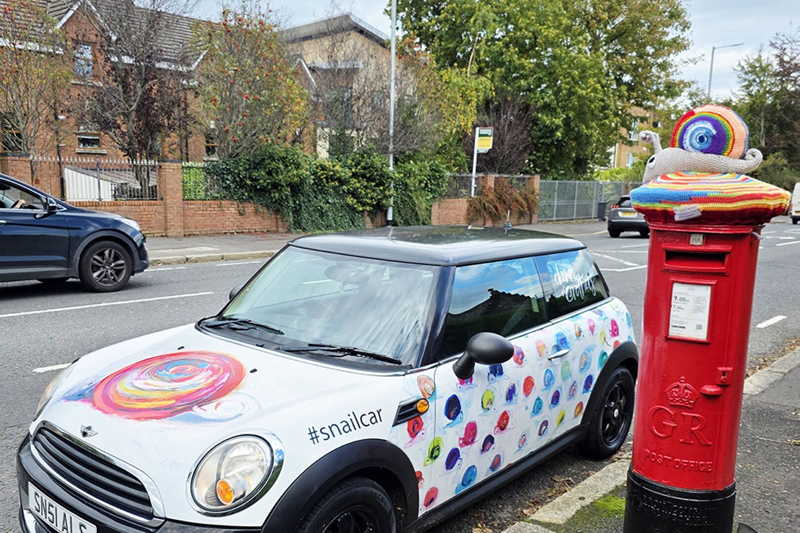 The Snail Artist: Postbox toppers appear in cities across UK to ...