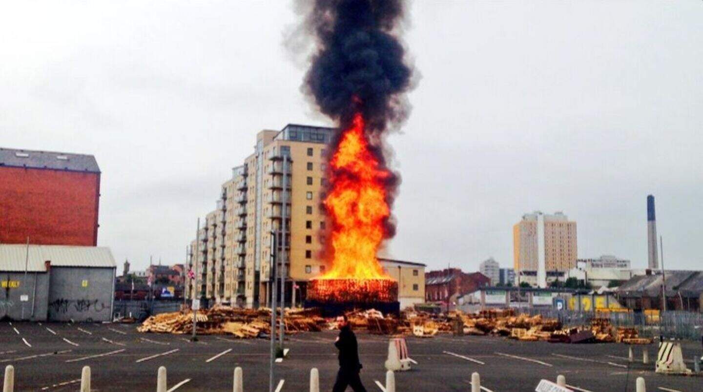 Sandy Row bonfire: Man arrested amid disturbances after early lighting ...