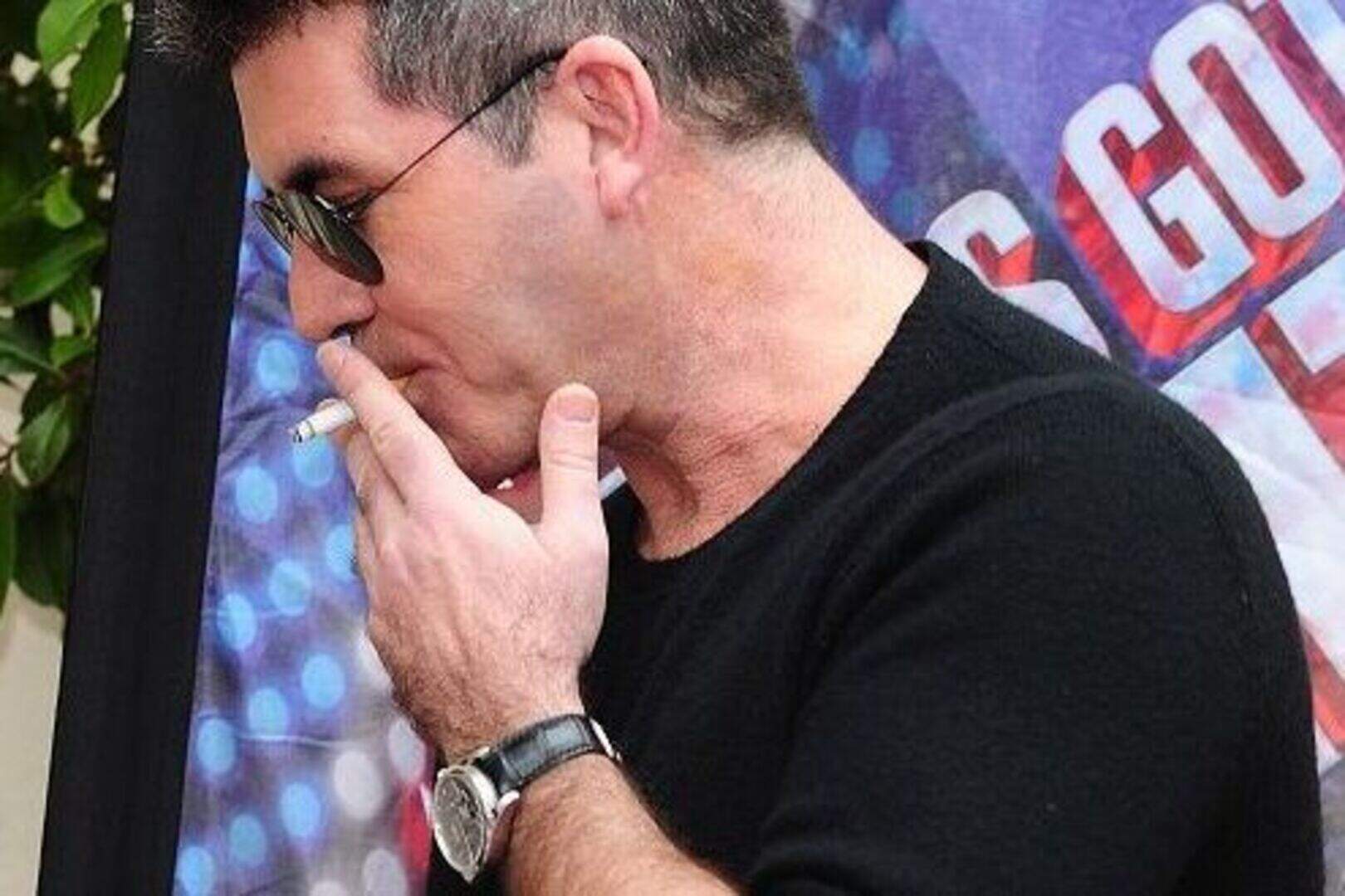 simon cowell cigarette Simon Cowell tries to quit smoking