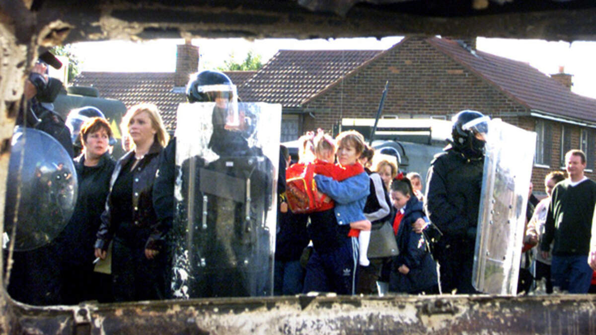 Parent and pupil caught up in the loyalist protest at Holy Cross reflect on shameful events 25 years on: ‘I can still see the anger on the faces’