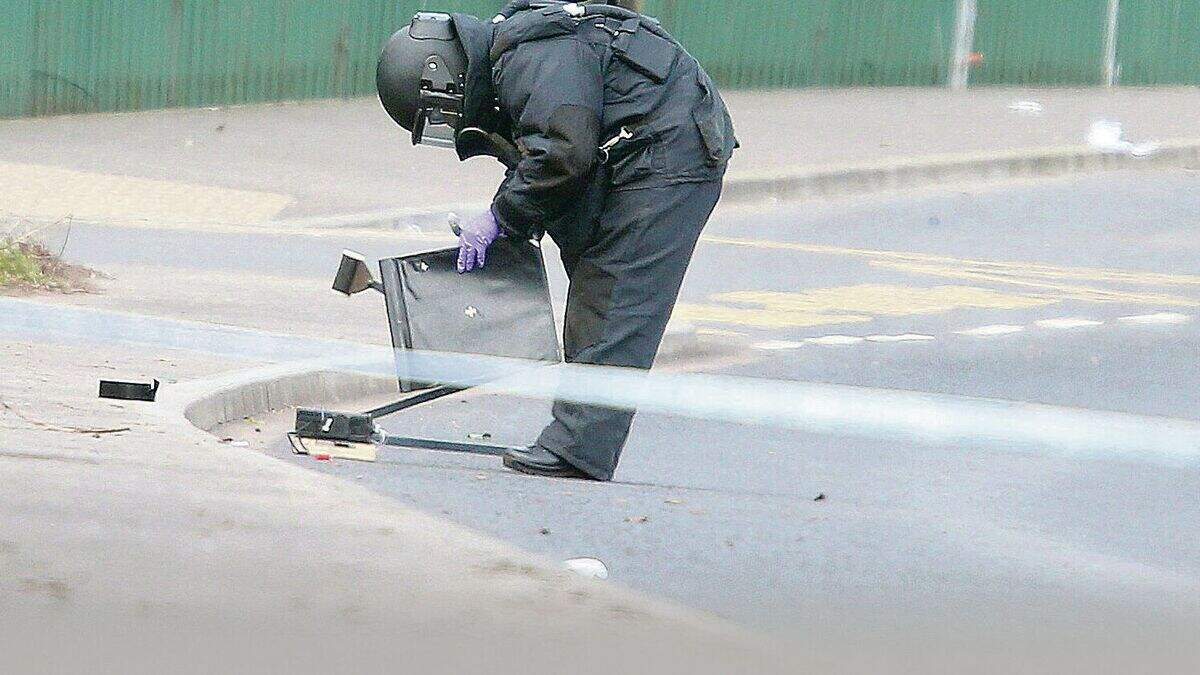 PSNI officer's miracle escape after dissident bomb falls from car in ...