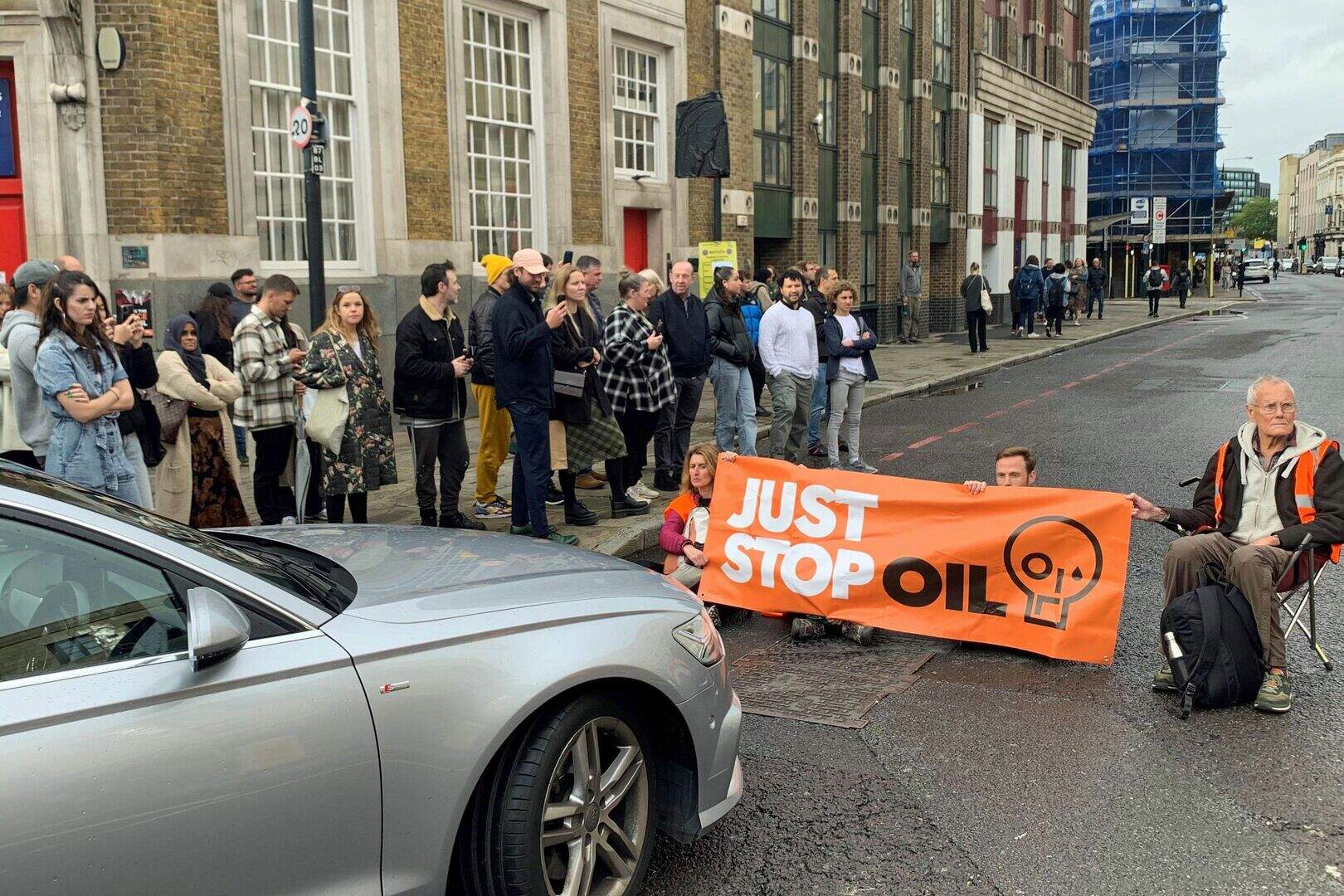 Woman with sick child shouts at Just Stop Oil activists for blocking ...