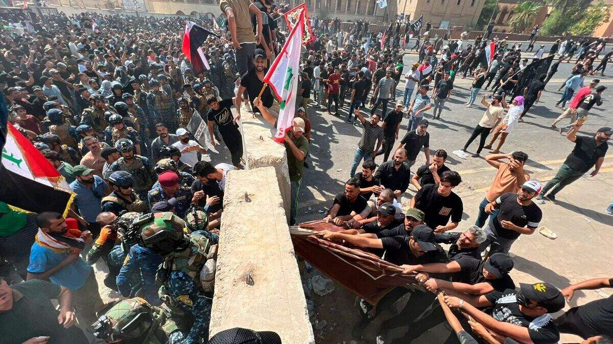 Cleric’s followers force way into Iraqi parliament for second time this ...