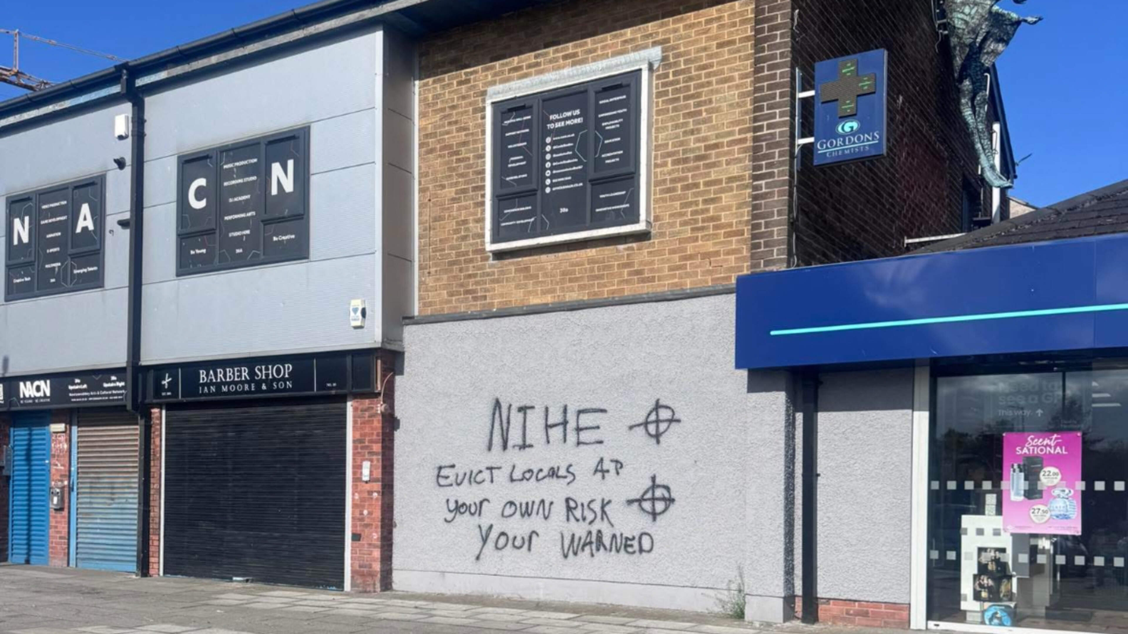 ‘Evict locals at your own risk’ graffiti daubed on business in Rathcoole