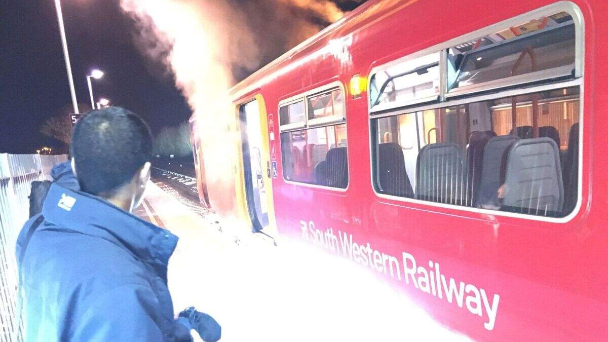 Fire and ‘explosions’ next to packed commuter train force passengers to ...