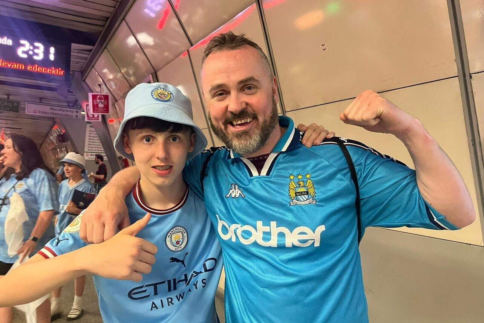 Father and son Manchester City fans hail ‘once in a lifetime’ Champions ...