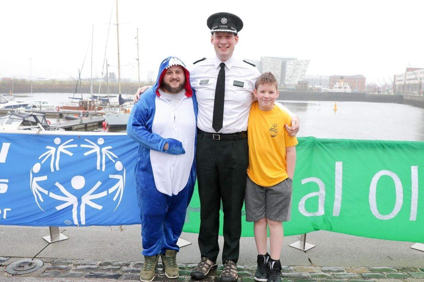 Splash! Charity fundraisers take polar plunge into Belfast's Lagan ...