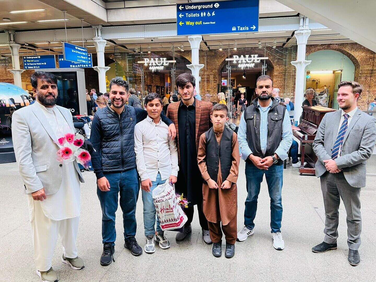 Afghan boy, 11, reunited with twin brother in UK after a year stranded ...