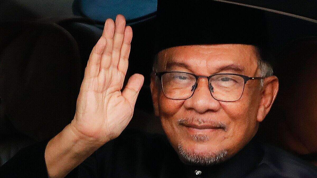 Reformist Anwar Ibrahim sworn in as new Malaysian PM | Belfast Telegraph