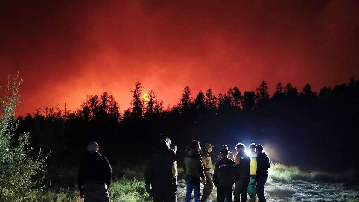 Wildfires endanger villages and fuel site in Russia’s Siberia | Belfast ...