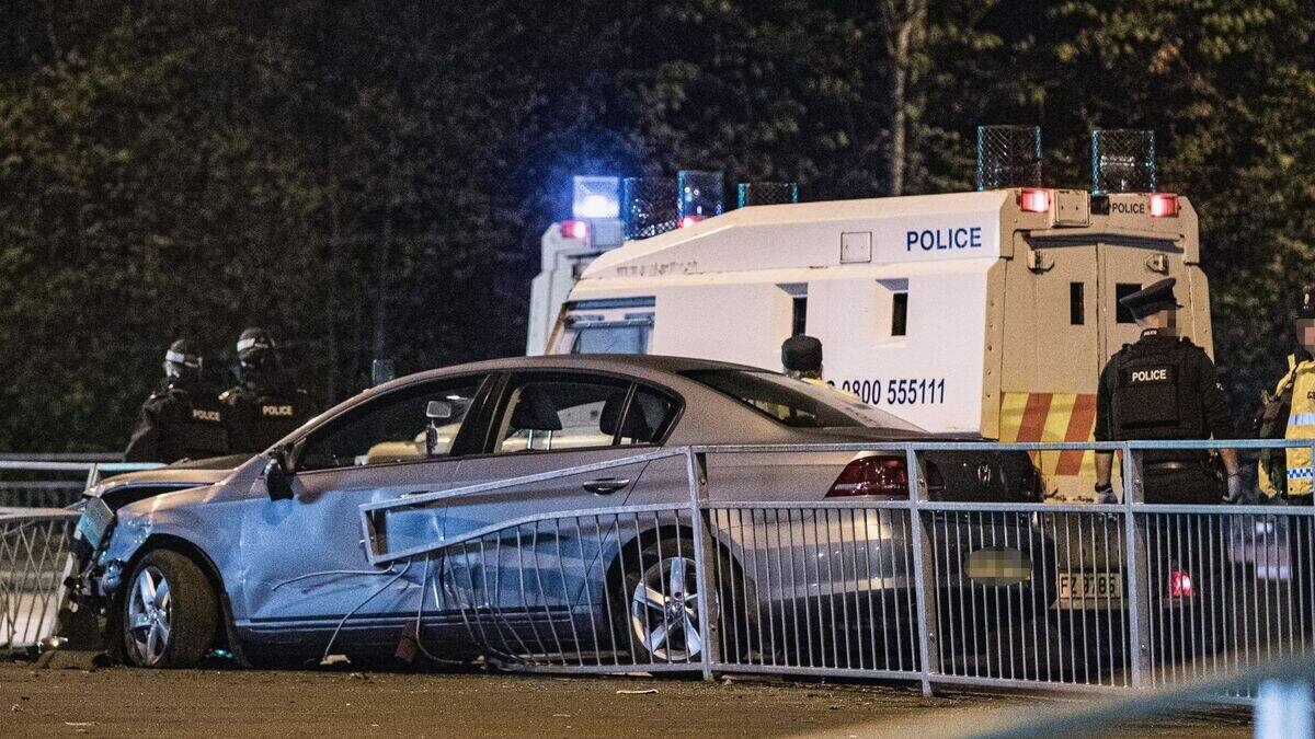 McKinstry Road: Man arrested after car crashes into barrier at west ...