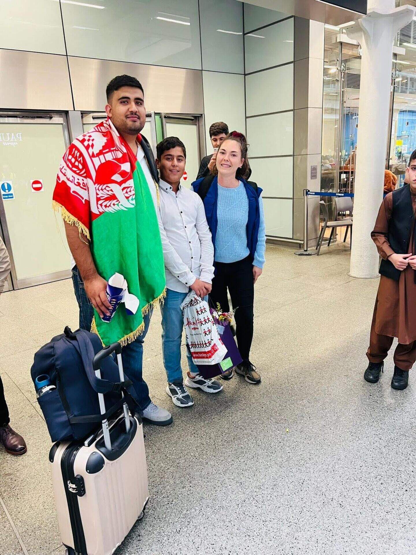Afghan boy, 11, reunited with twin brother in UK after a year stranded ...