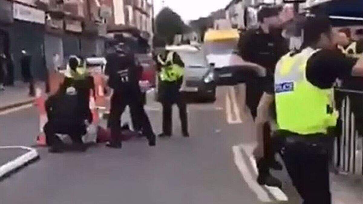 Man charged with attempted murder after police officer run over with ...
