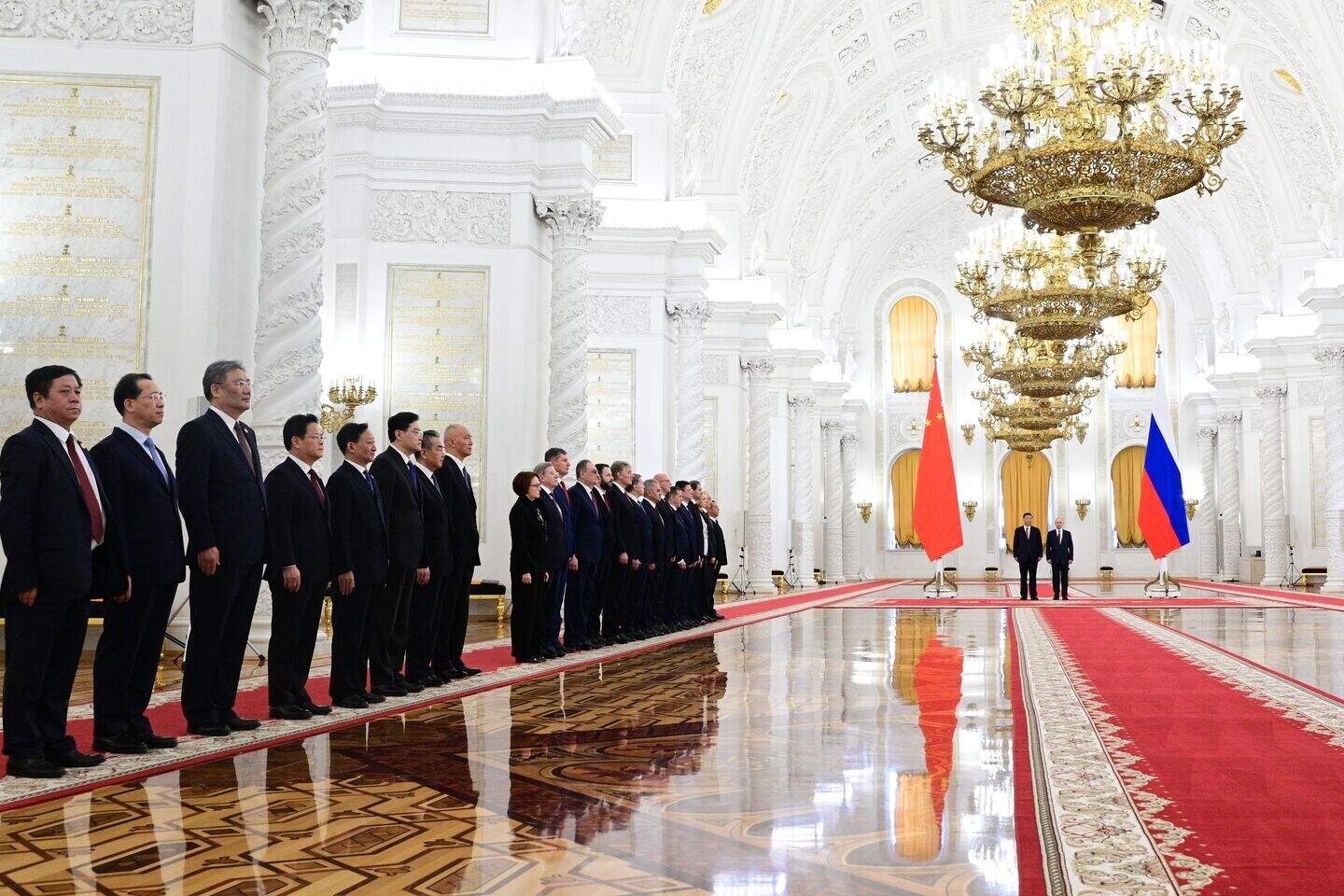 Putin hosts Xi in the Kremlin with imperial palace pageantry | Belfast ...