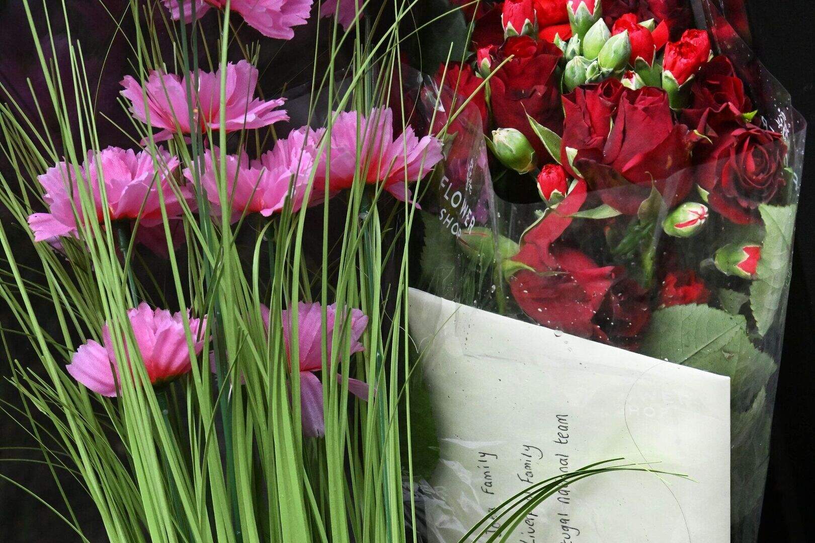 Liverpool fans lay flowers and tributes to Diogo Jota outside Belfast ...