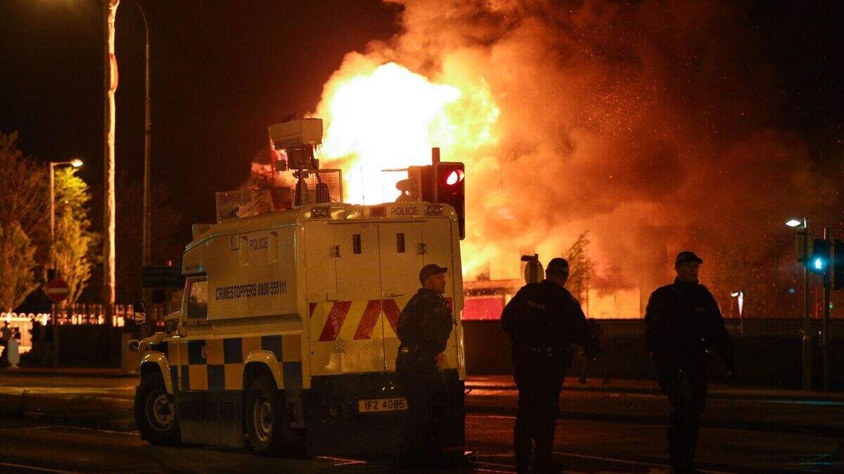 Divis Hoods torch cars and goad PSNI at internment night bonfire ...