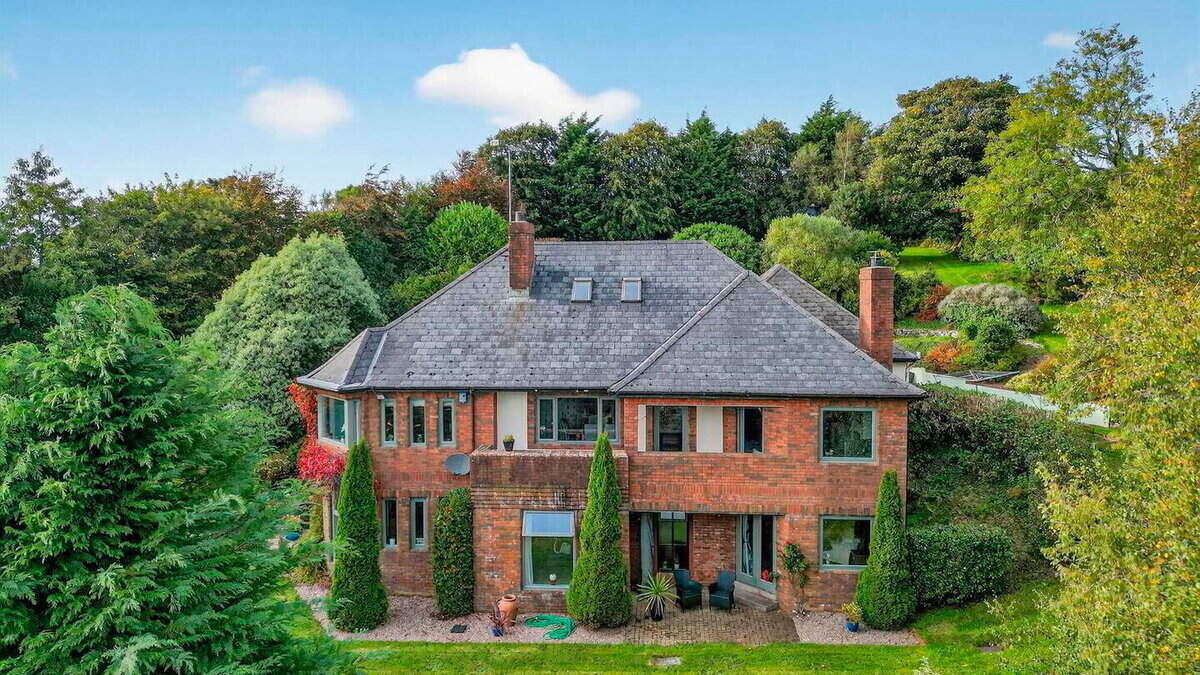 Drink in views of Mournes at idyllic, 1.5-acre retreat close to Crossgar