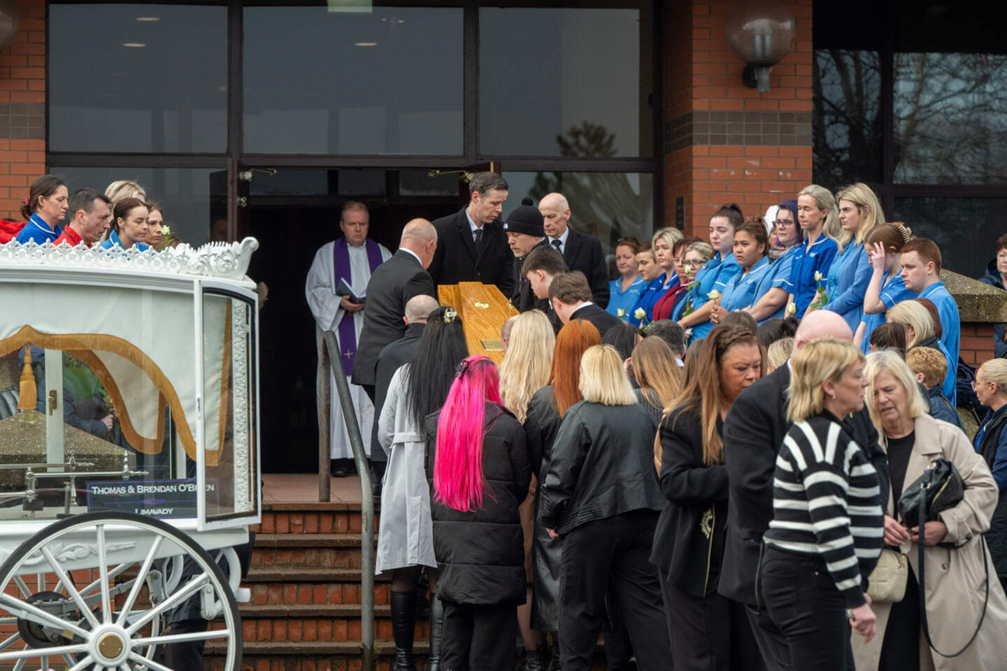Amy Doherty’s coffin is carried into Holy Family chapel