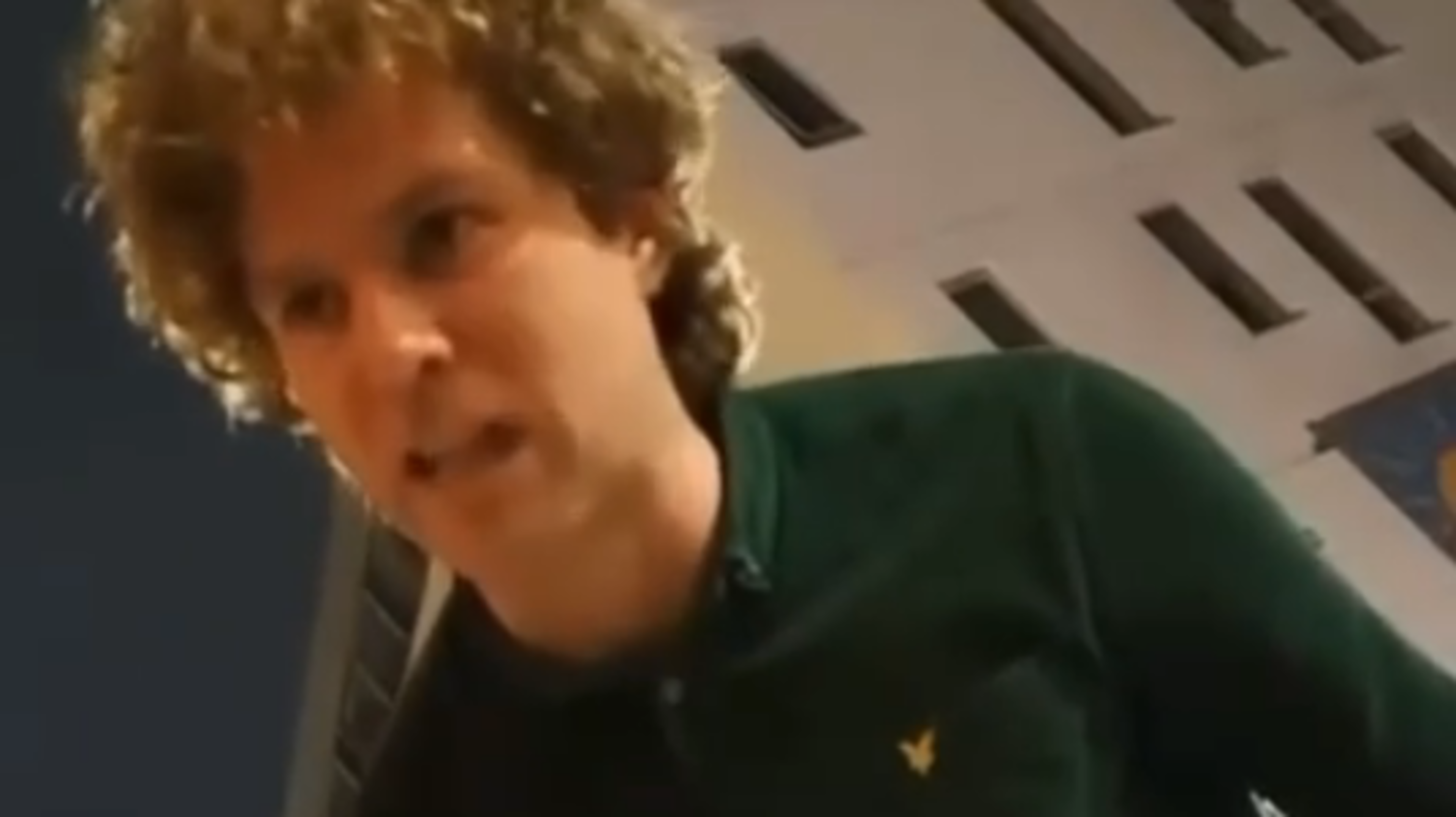 Thug filmed racially abusing homeless man unmasked as former trainee barrister